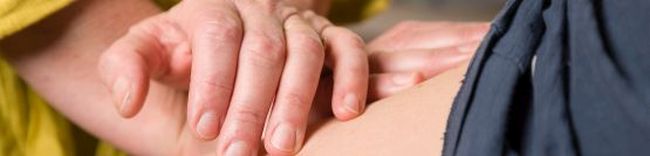 Foto Hände massieren Rücken